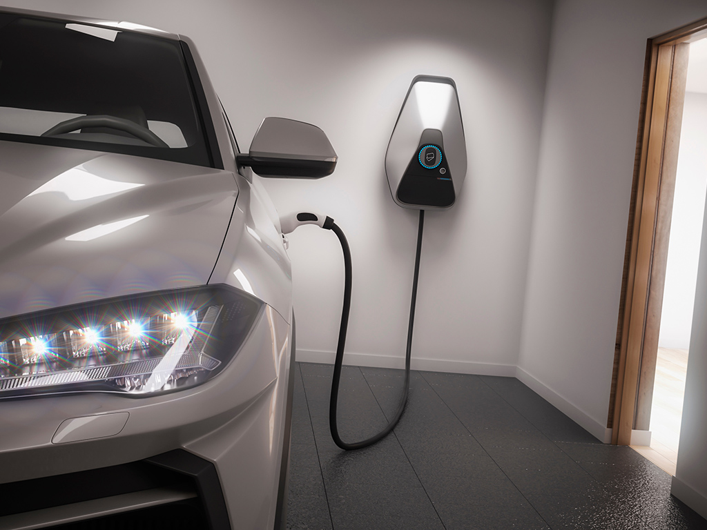 Garage interior with car on EV charger